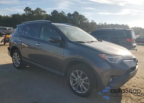 2016 Toyota Rav4 Limited из США, поврежденный, VIN JTMYFREV8GJ098113